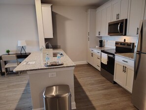 Fridge, dining tables - Landing | Incredible 1BD, Pool, Gym (Newberry)