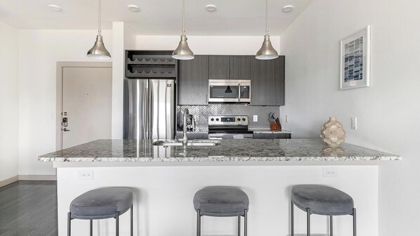 Fridge, dining tables - Landing | Stylish 1BD, Pool, Gym (Allen)