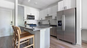 Fridge, dining tables - Landing | Beautiful 1BD, Game Room, Pool (Jacksonville)