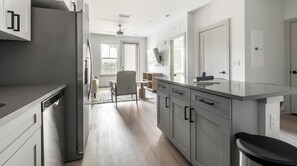 Fridge, dining tables - Landing | Chic 1BD, Gym, Courtyard (Jacksonville)