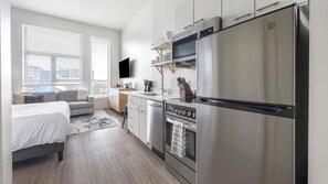 Fridge, dining tables - Landing | Spectacular Studio, Clubhouse, Gym (Denver)