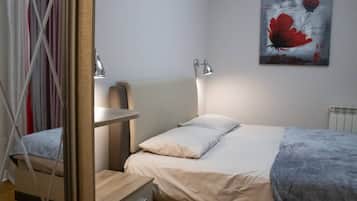 2 chambres, fer et planche à repasser, Wi-Fi, draps fournis