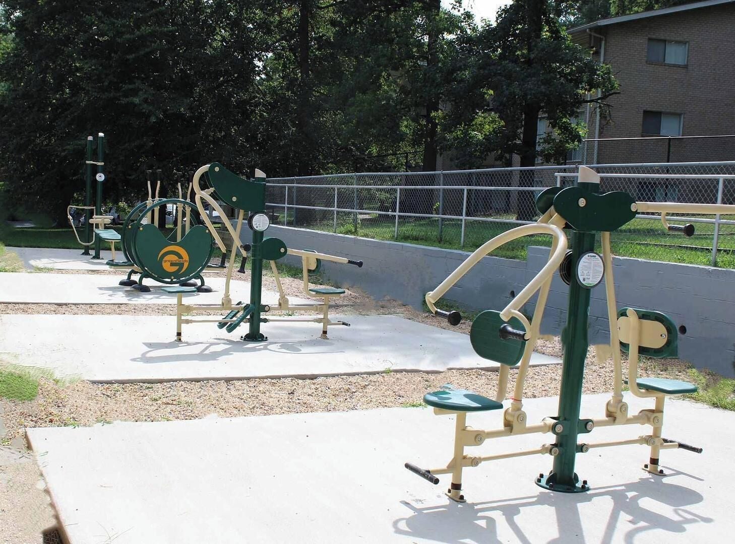 Outdoor exercise equipment in a park setting.