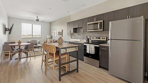 Fridge, dining tables - Landing | Modern 2BD, Yoga Studio, Pool (Glendale)