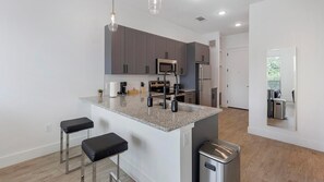 Fridge, dining tables - Landing | Beautiful Studio, Courtyard, Clubhouse (Denton)