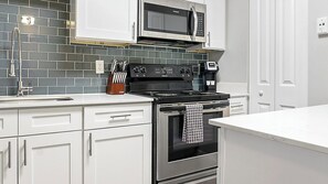 Fridge, dining tables - Landing | Modern 1BD, Pool, Courtyard (Indianapolis)