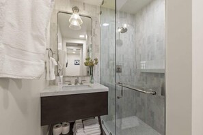 Shower, hair dryer, shampoo