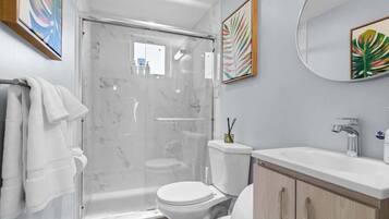 Hair dryer, towels, soap, shampoo
