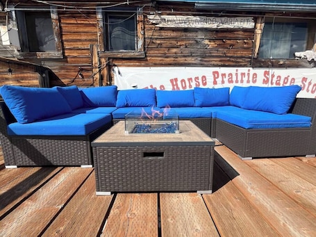 Terrace/patio. Sacajawea Room, 1 Queen Bed, Rustic Old Hunting Lodge, Horse Prairie Stage Stop