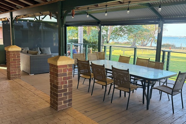Massive outdoor seat area overlooking estuary