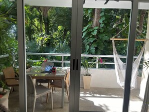 Outdoor dining - Your Grand Sirenis Getaway Awaits!
 2-bedroom condo with beautiful jungle views (Grand Sirenis)
