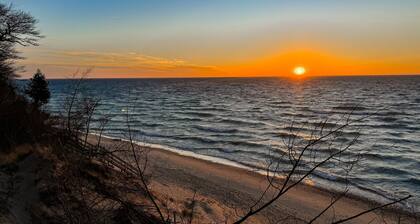 Rustic-style cottage w/ full kitchen, near town, Lake Michigan access, & WiFi