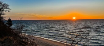 Rustic-style cottage w/ full kitchen, near town, Lake Michigan access, & WiFi