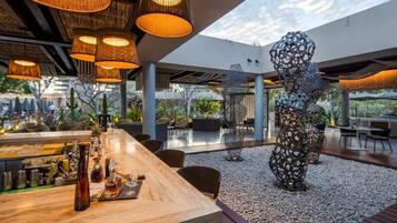 3 bars/lounges, swim-up bar, poolside bar