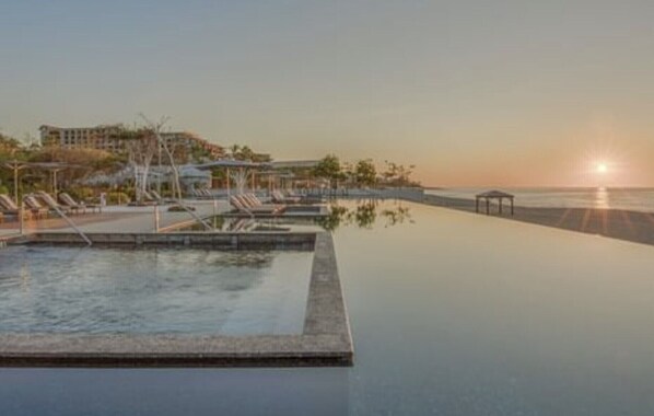 4 outdoor pools, pool cabanas (surcharge), pool umbrellas