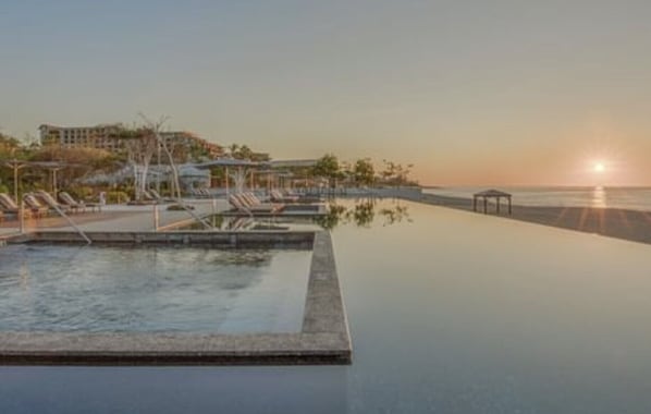 4 outdoor pools, pool cabanas (surcharge), pool umbrellas
