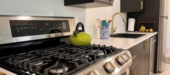 Nestled on the Marianna Butte Golf Course in Loveland, this modern garden-level basement retreat offers stunning mountain & lake views through large windows, flooding the space with light. Just a short drive to CSU campus & Estes Park