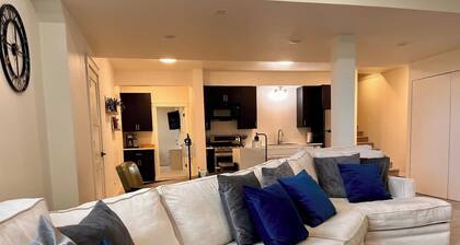 Nestled on the Marianna Butte Golf Course in Loveland, this modern garden-level basement retreat offers stunning mountain & lake views through large windows, flooding the space with light. Just a short drive to CSU campus & Estes Park