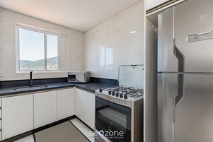 Apartamento básico | Cozinha privada | Talheres/pratos/utensílios de cozinha