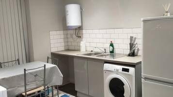 Microwave, oven, electric kettle, dining tables