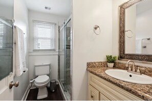 Shower, hair dryer, bidet, towels