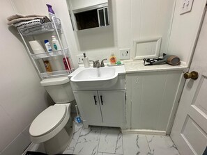 Hair dryer, towels, soap, toilet paper