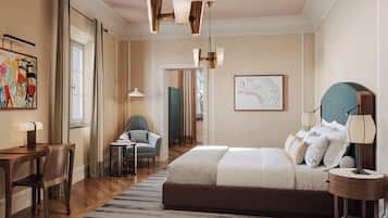 A hotel room with a large bed, a desk, a chair, and a small table. There is a window with curtains, a painting on the wall, and a map.
