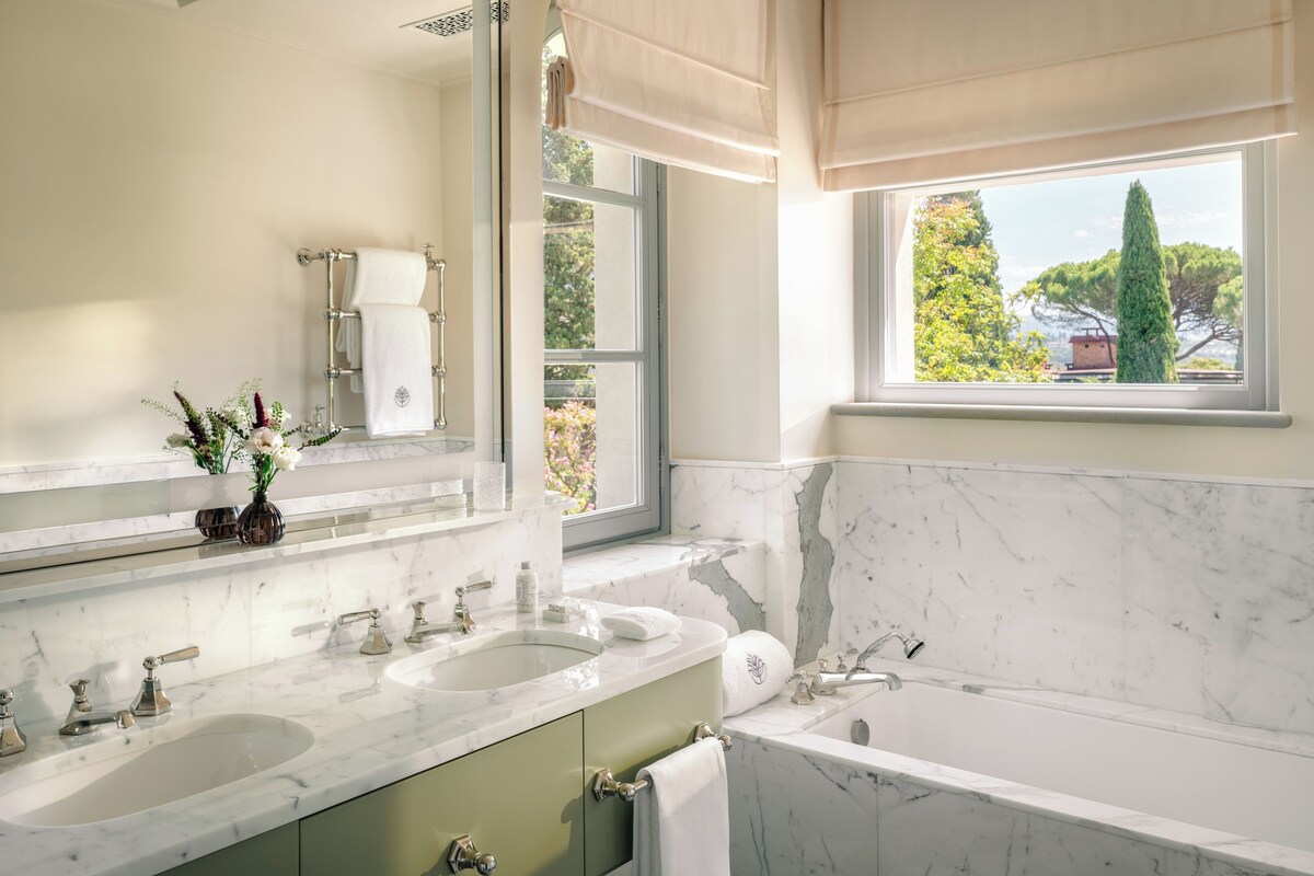 Designer toiletries, bathrobes, slippers, towels
