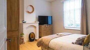 4 slaapkamers, een strijkplank/strijkijzer, wifi, beddengoed