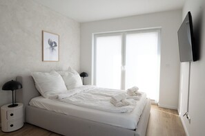 1 dormitorio, tabla de planchar con plancha, wifi y ropa de cama
