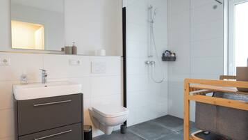 Hair dryer, towels, soap, toilet paper