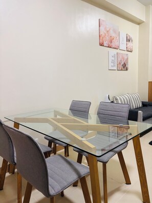 Condo, 1 Bedroom, Balcony, Pool View | Dining - Tranquil Poolside Balcony (Iloilo)