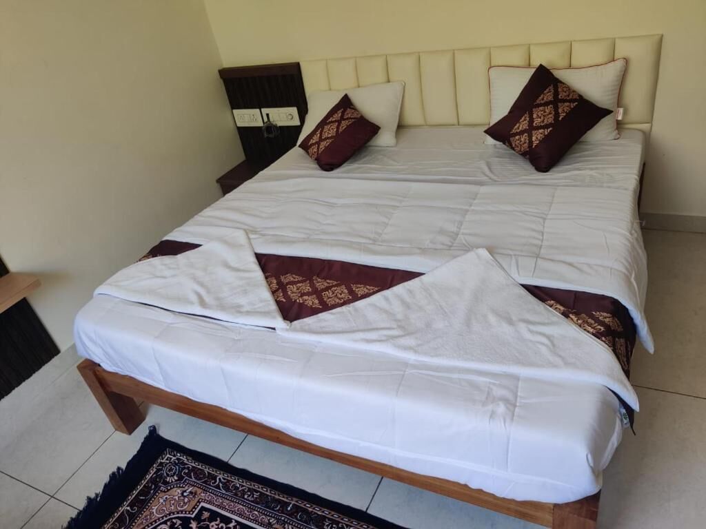 Tweepersoonskamer, uitzicht op tuin | Een kluis op de kamer, verduisterende gordijnen, geluiddichte muren