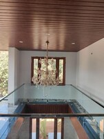 Habitación triple, vistas al jardín | Interior