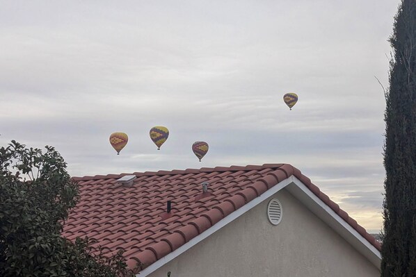 A building with a red-tiled roof and a small window. - 6 Mi to Balloon Fiesta | Patio & Outdoor Bar (Albuquerque)