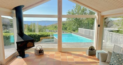 Architect-designed villa with pool, sauna and sea view in Mjörn | SE09124