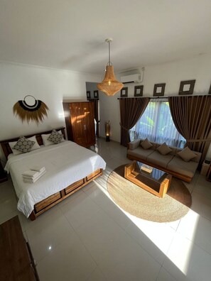 Deluxe Double Room, Balcony, Pool View | Blackout drapes, soundproofing, iron/ironing board, free WiFi - Glam Canggu (Canggu)