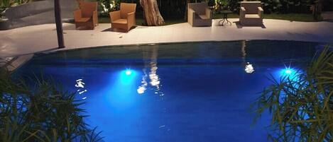 Outdoor pool, pool umbrellas, sun loungers