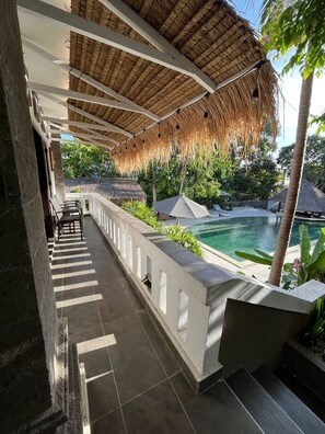 Deluxe Double Room, Balcony, Pool View | Terrace/patio - Glam Canggu (Canggu)