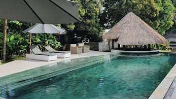 Outdoor pool, pool umbrellas, pool loungers