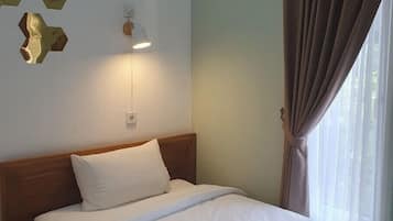 Blackout curtains, soundproofing, iron/ironing board, free WiFi