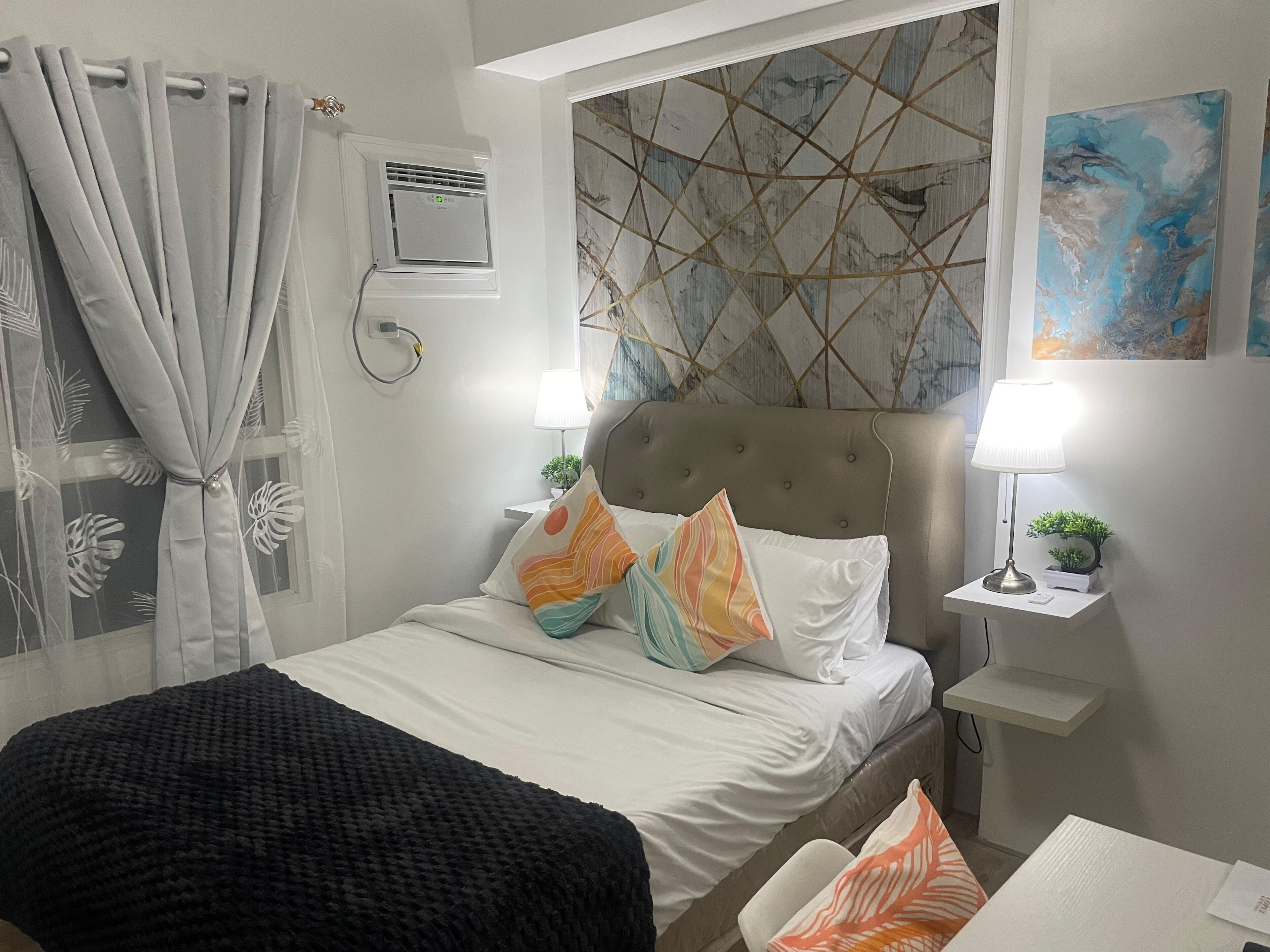 Estudio Confort, acceso a la alberca, vista a la ciudad | Área de sala de estar