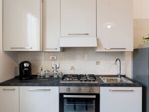 Fridge, microwave, oven, cookware/dishes/utensils