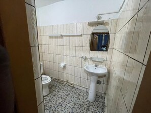 Bidet, soap, toilet paper