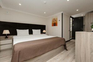 Standaard tweepersoonskamer, uitzicht op stad | Luxe beddengoed, Select Comfort-bedden, een minibar