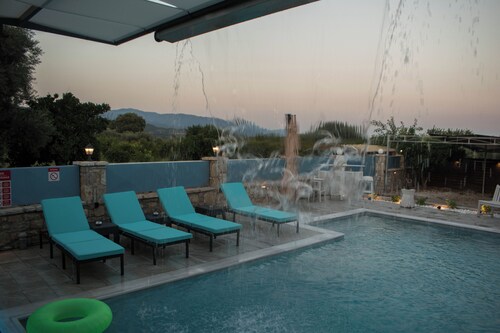 Stone villa with private pool and elegant modern interior for a luxury escape.