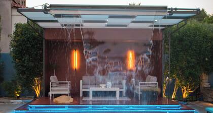 Stone villa with private pool and elegant modern interior for a luxury escape.