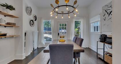 Charming 2BR/2BA lower-level unit in a classic Inman Park duplex. Features full kitchen, cozy living area with fireplace, Southern-style front porch, clawfoot tub, in-unit laundry, and dedicated parking. Walkable to dining and MARTA.