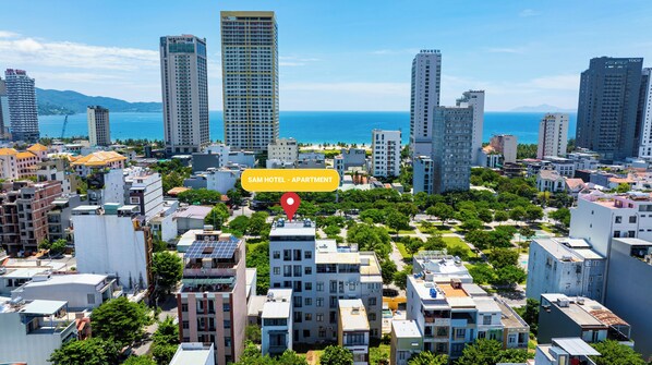 A cityscape with a prominent hotel named "SAMI HOTEL - APARTMENT" marked by a red pin. - Sam Hotel & Apartment Da Nang (Da Nang)