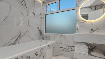 Studio, Multiple Beds, Kitchen (Separate Bath) | Bathroom | Shower, hair dryer, towels, soap